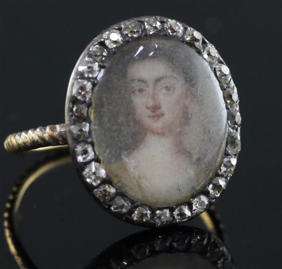 A George III gold and diamond set oval portrait ring, size G/H.